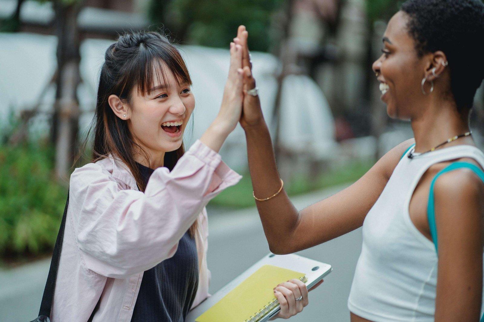 Two women encouraging and empowering each other through solution-focused listening.